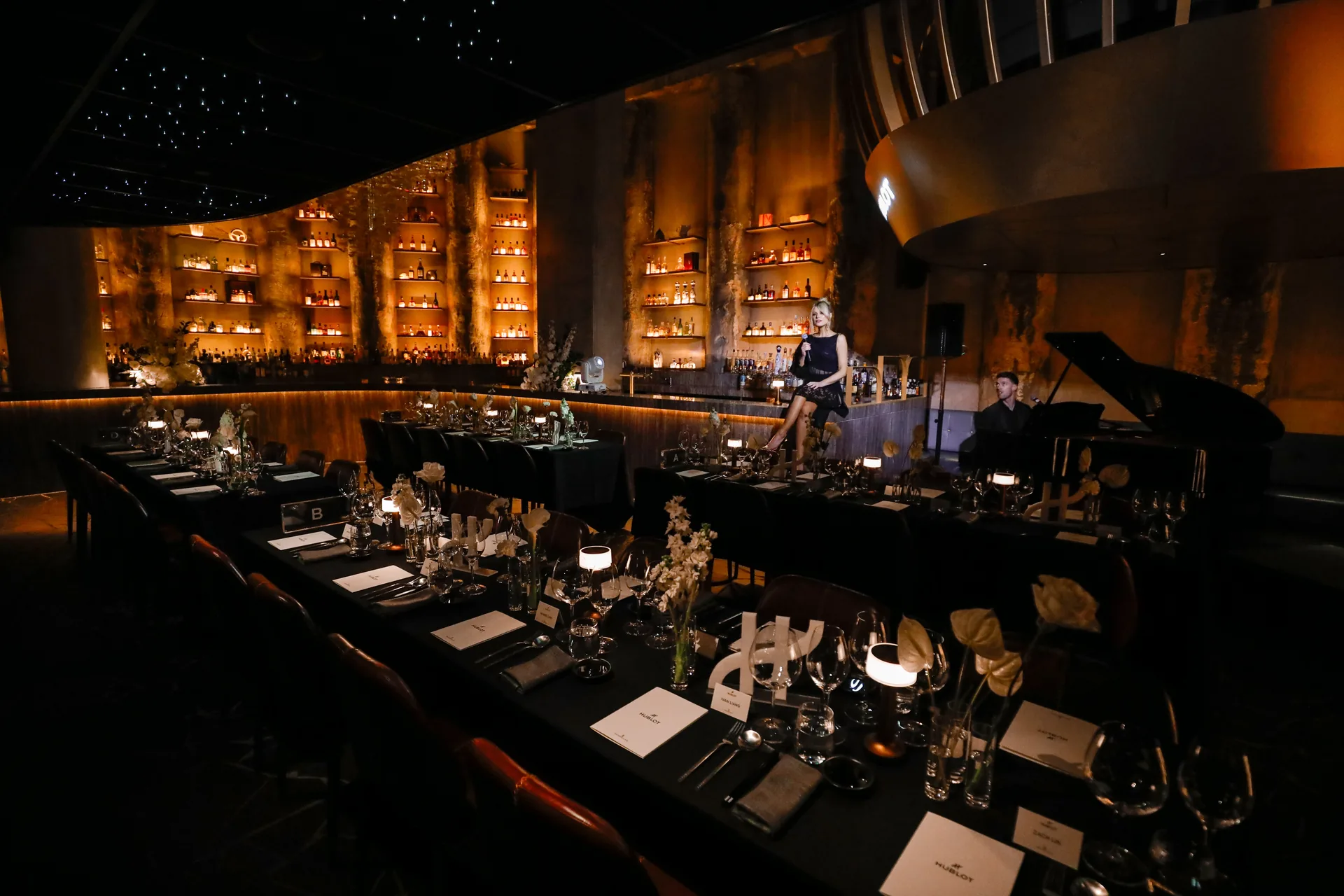 Vocalist and pianist performing at a Hublot dinner by Beck Entertainment