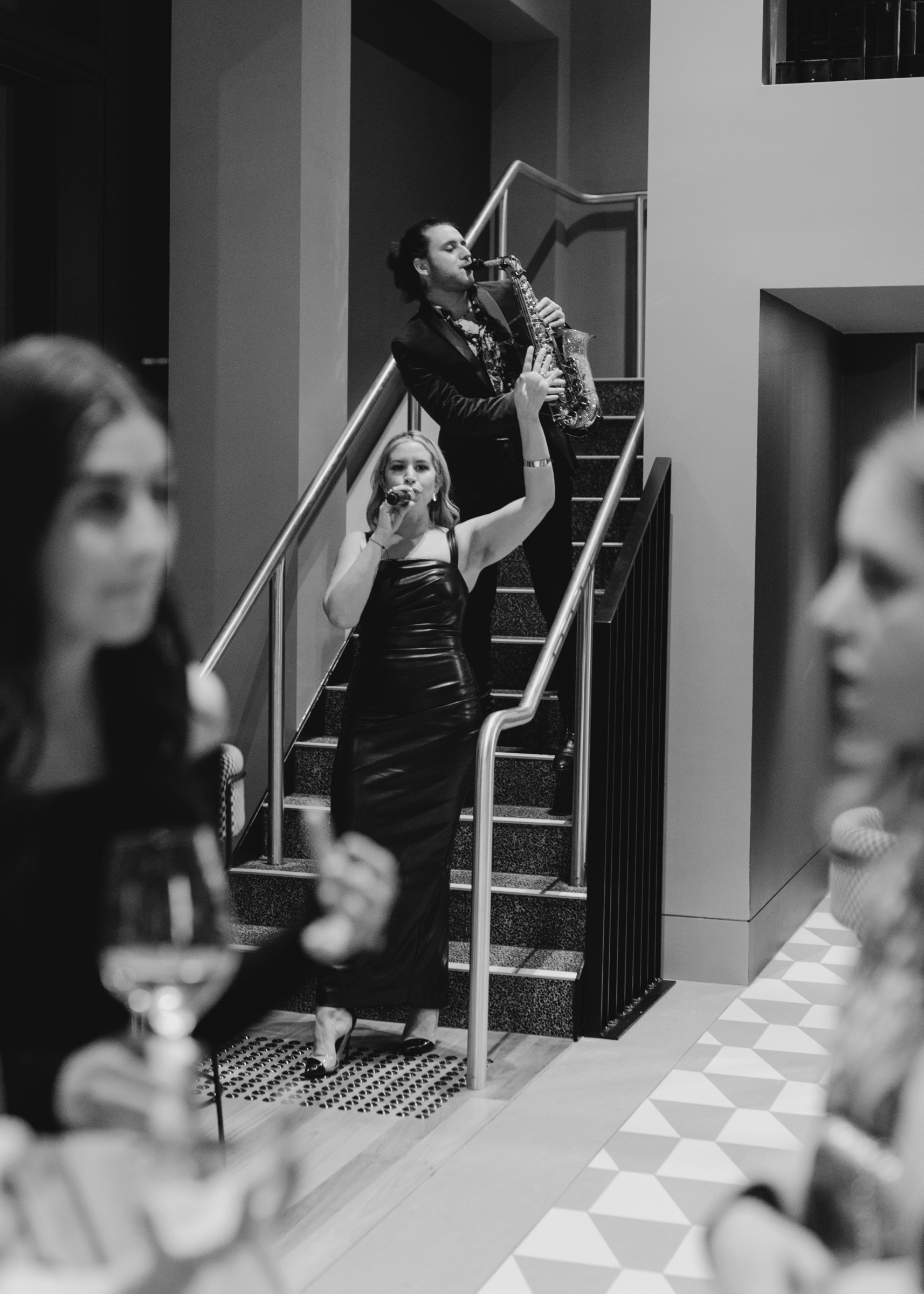 Vocalist and saxophonist performing at a private celebration